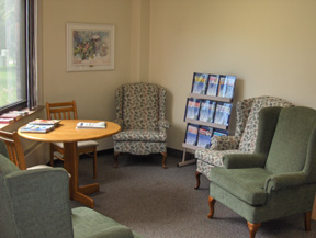 Riverview Heights sitting room with chairs and table