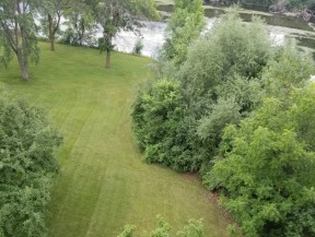 Riverview Heights aerial view of the yard and water